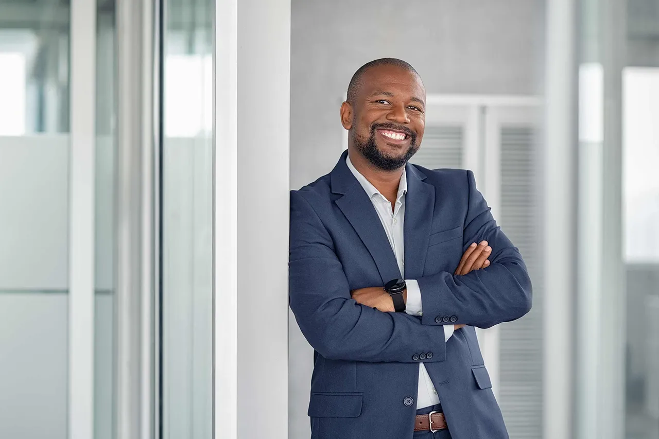 African American man standing in an office