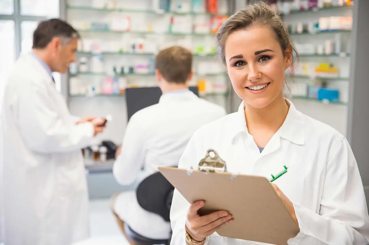 Female pharmacist with a clipboard